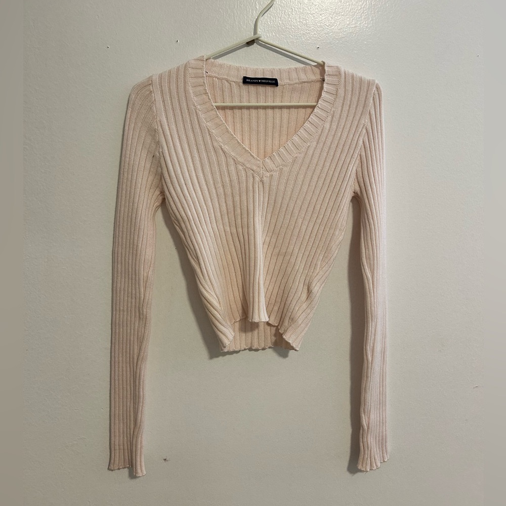 Brandy Melville knitted light/baby pink long sleeve v-neck sweater top
